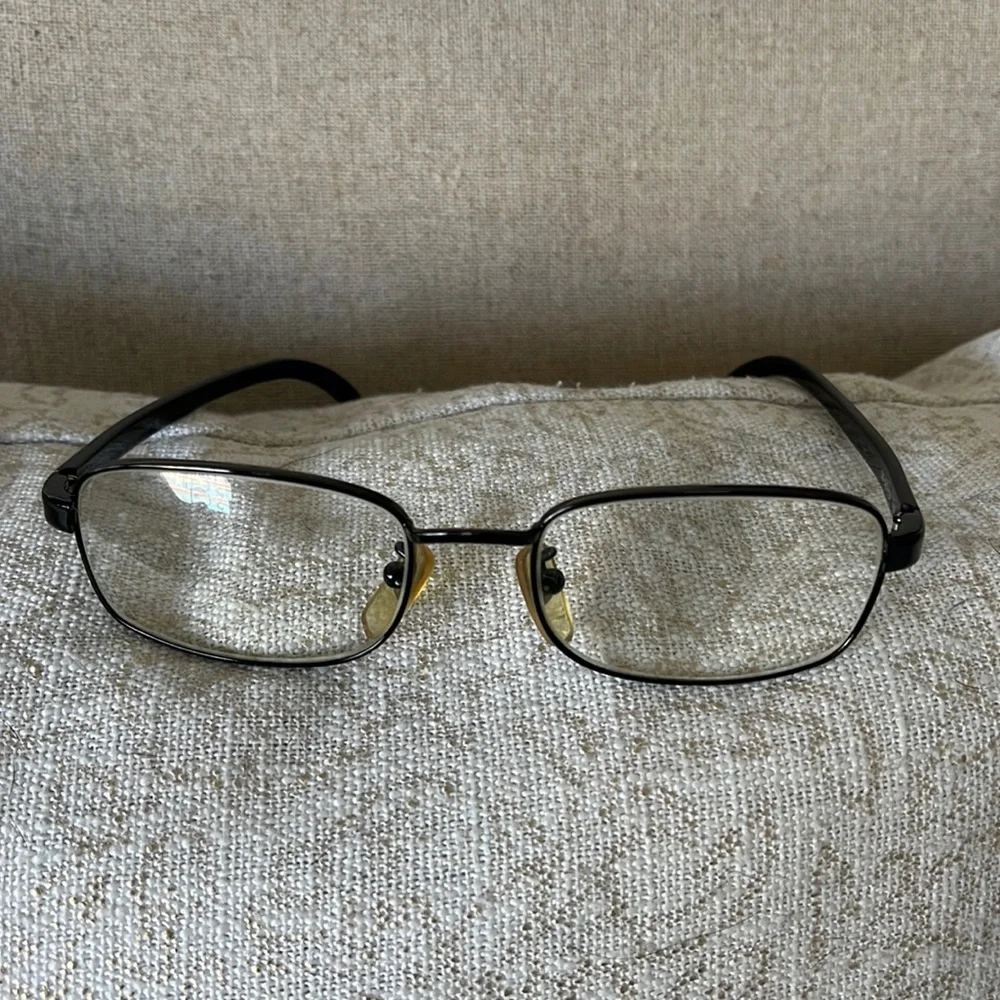 - Dolce and Gabbana black wire frame glasses